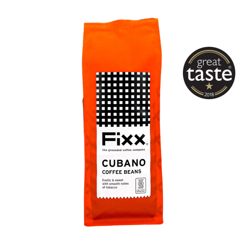 Orange package of Fixx Cubano coffee beans with a Great Taste award logo on a white background