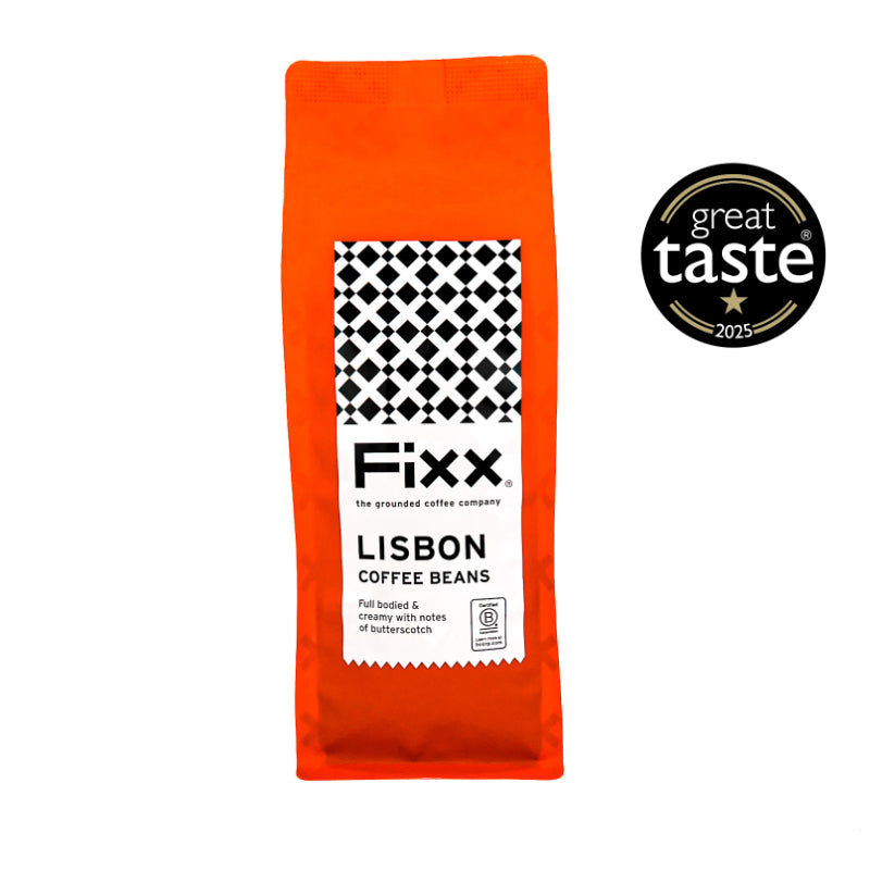 Orange package of Fixx Lisbon coffee beans with a Great Taste award logo on a white background