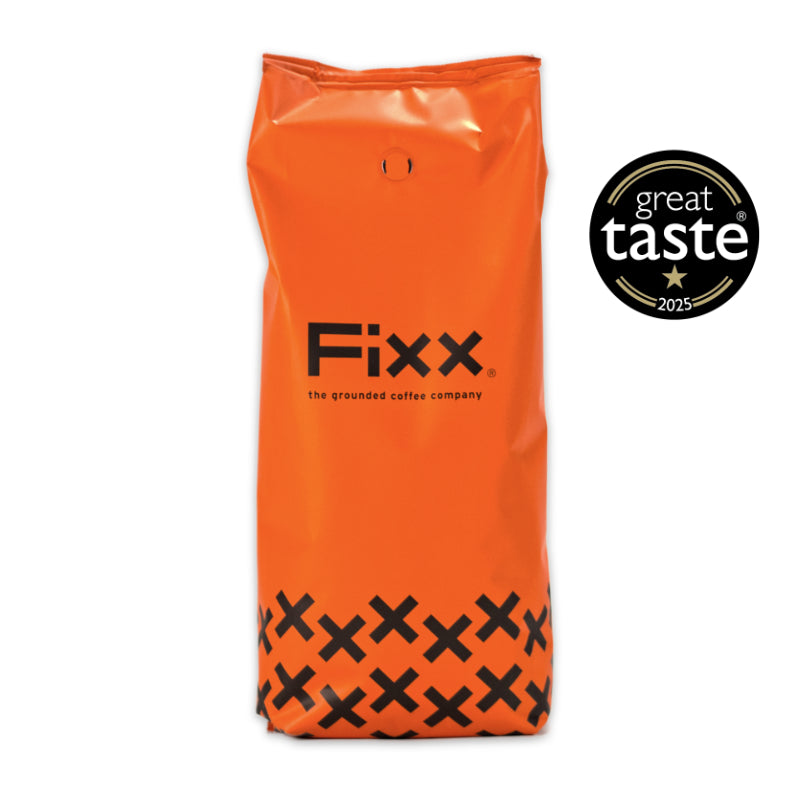 Orange bag of Fixx coffee with Great Taste award logo on a white background