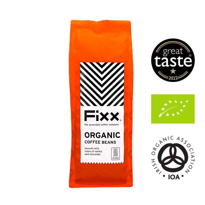 Orange package of Fixx Organic Coffee Beans with certification logos on a white background