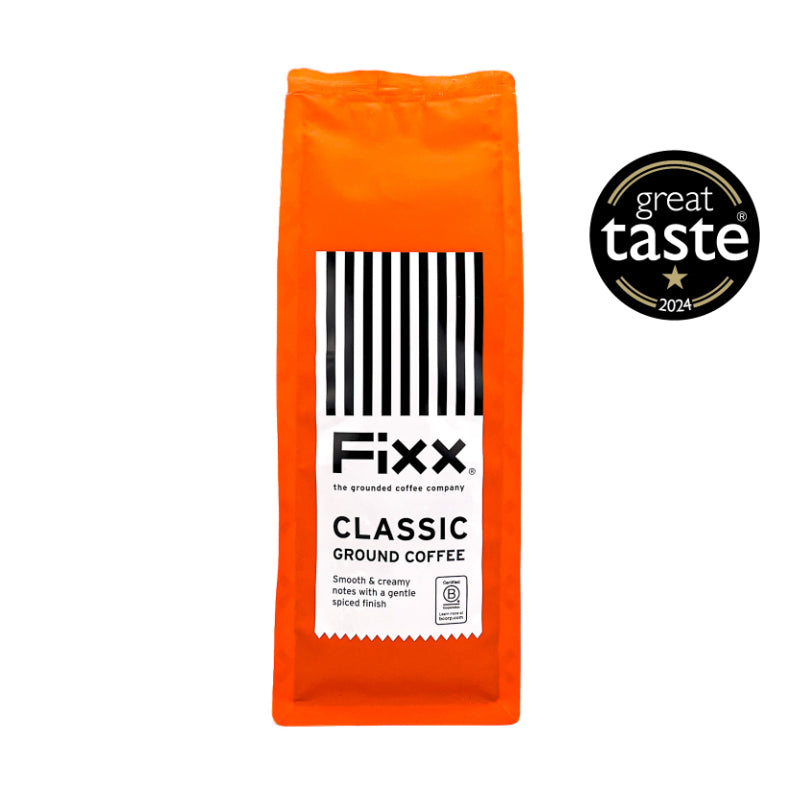 Orange package of Fixx Classic Ground Coffee with Great Taste 2024 award on a white background