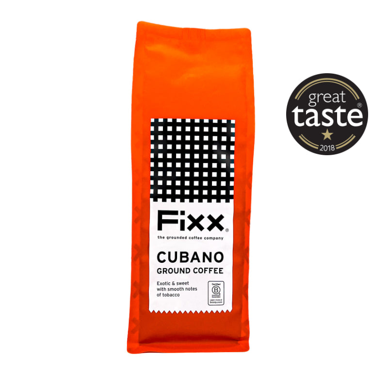 Orange package of Fixx Cubano Ground Coffee with Great Taste award logo on a white background