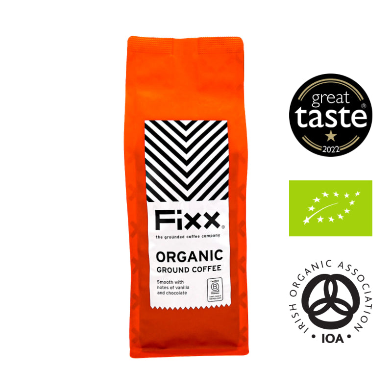 Orange package of Fixx organic ground coffee with certification logos on a white background